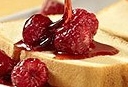 vanilla pound cake with berry sauce - author mona hodgson
